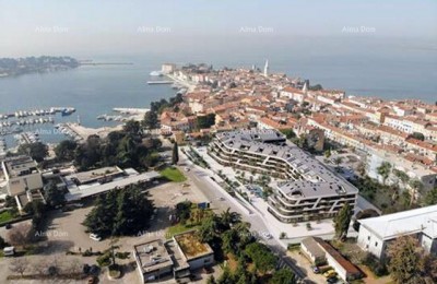 Poreč, woon- en bedrijfsgebouw in aanbouw met appartementen en ondergrondse garages