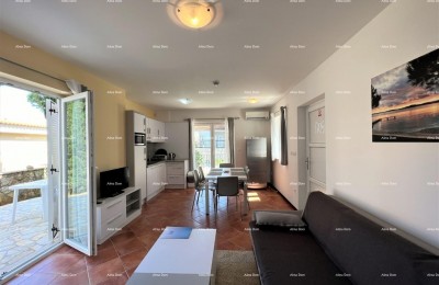 MEDULIN, POŠESI, APPARTEMENT 73,54 m² MET TUIN, 150 m VAN DE ZEE