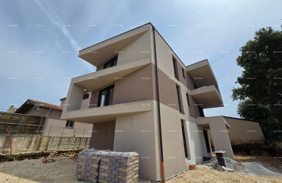 Twee-slaapkamer appartement met grote tuin op 100 meter van de kust.