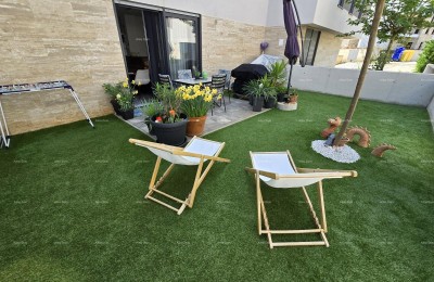 Nieuwbouw! Twee-slaapkamer appartement met tuin!