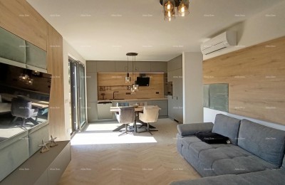 BANJOLE – APPARTEMENT OP DE BEGANE GROND MET PRIVÉTUIN, 400 M VAN DE ZEE