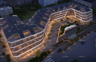 Poreč, woon- en bedrijfsgebouw in aanbouw met appartementen en ondergrondse garages