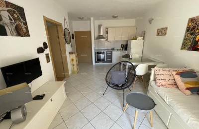 PEROJ - Begane grond appartement met tuin en parkeerplaats dichtbij de zee
